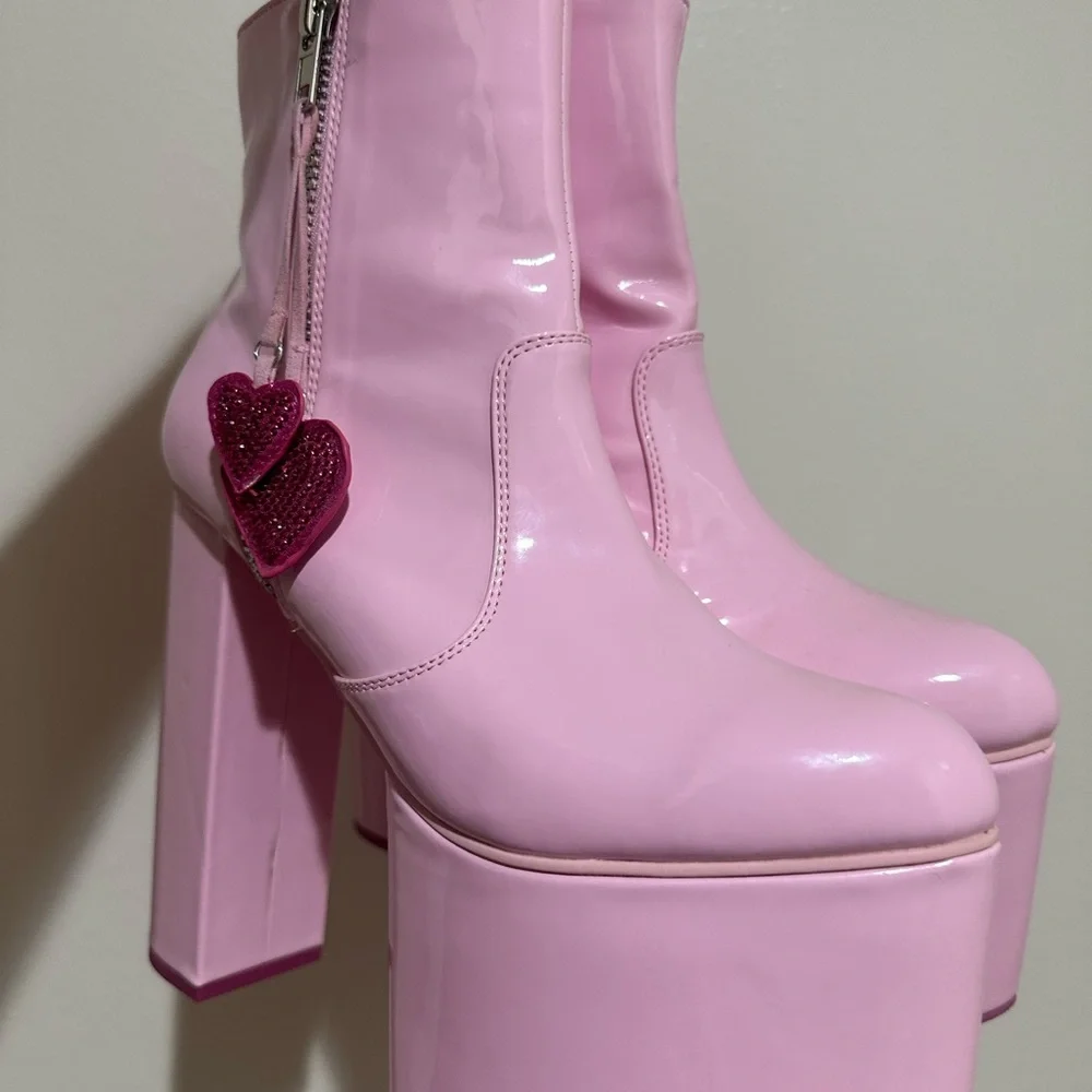 Dolls Kill Glossy Pink Platform Boots with Heart Accents